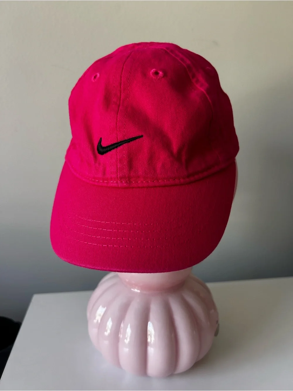Infant hot pink with black Nike check baseball hate